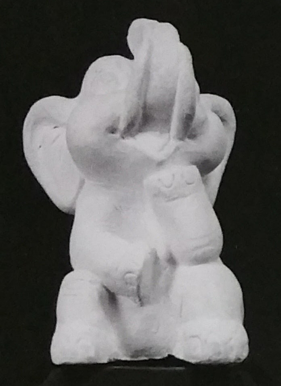 Raw chalkware elephant statue