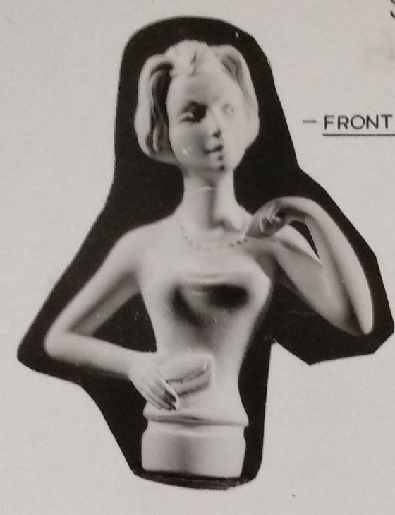 Top torso lady figurine hold a purse in right hand